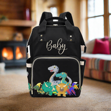 Load image into Gallery viewer, Designer Baby Bag With Cute Cartoon Dinosaurs - Waterproof Multifunction Backpack in Black